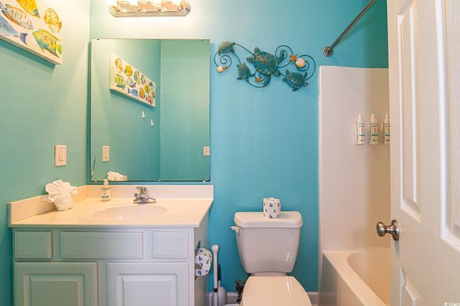 Bathroom with toilet and vanity | Image 15