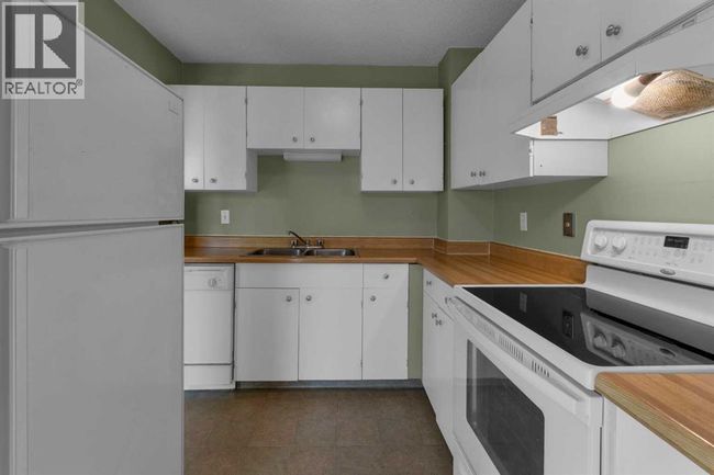 116 Silver Crest Dr Nw, Townhouse with 3 bedrooms, 2 bathrooms and 1 parking in Calgary AB | Image 5