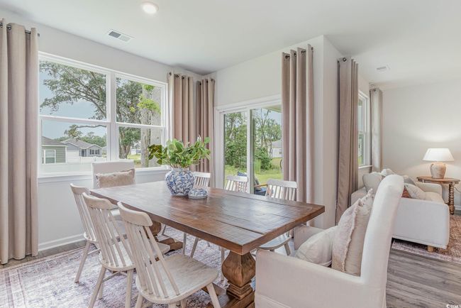 Dining area with hardwood / wood-style flooring | Image 7