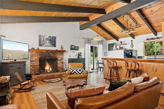 Main floor with knotty pine ceilings. | Image 10