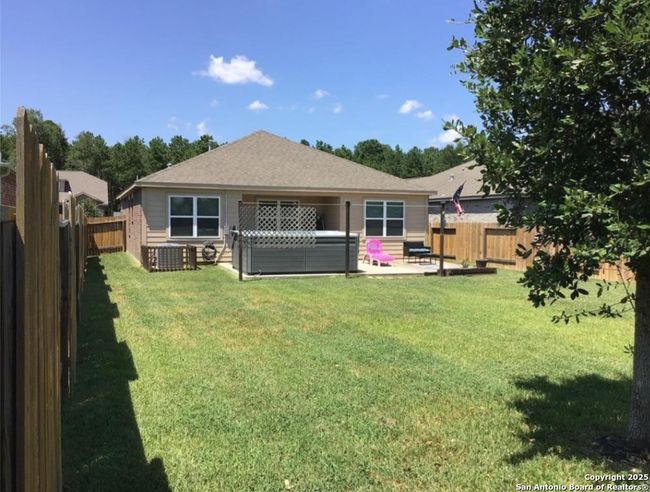 7712 Boulder Sunstone Ln, House other with 3 bedrooms, 2 bathrooms and null parking in Conroe TX | Image 4