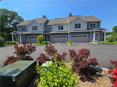 View of front facade with double garage | Image 1