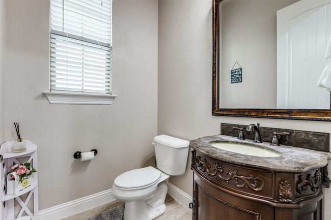 Half bath with vanity and tile patterned flooring | Image 24