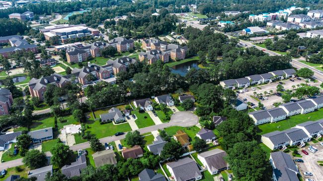 View of property location featuring nearby suburban area and a large body of water | Image 10