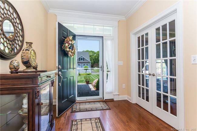 Upon entering, you will note the transom window over the front door, which adds brightness to the foyer. | Image 4