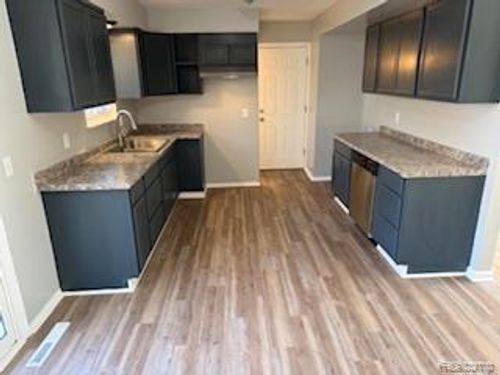 6111 Woodmoor Dr, Burton, MI, 48509-1646 | Card Image