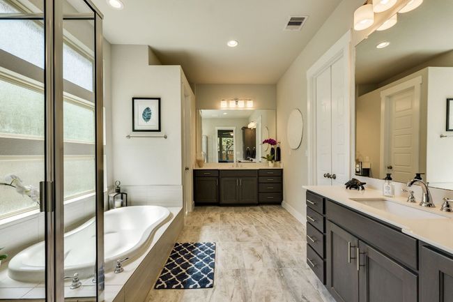 Primary bathroom with dual vanities | Image 25