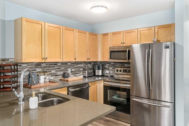 1110 - 2518 Fish Creek Boulevard Sw, Condo with 2 bedrooms, 1 bathrooms and 2 parking in Calgary AB | Image 6