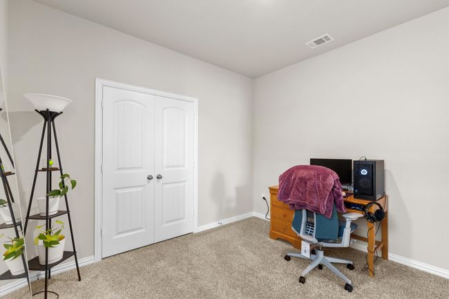 Carpeted office featuring baseboards | Image 12