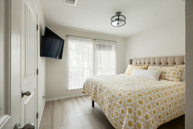 Neutral tones and clean lines create a welcoming environment for visitors or family. | Image 20
