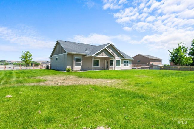 Back of house with board and batten siding | Image 32