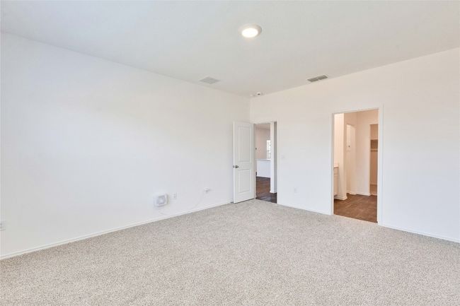 12305 Bulldogger Bnd, House other with 4 bedrooms, 3 bathrooms and 4 parking in Mustang Ridge TX | Image 10
