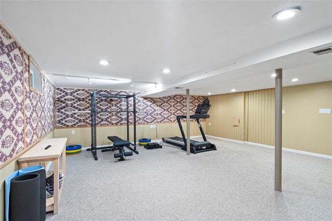 Back of house featuring a balcony and a wooden deck | Image 32