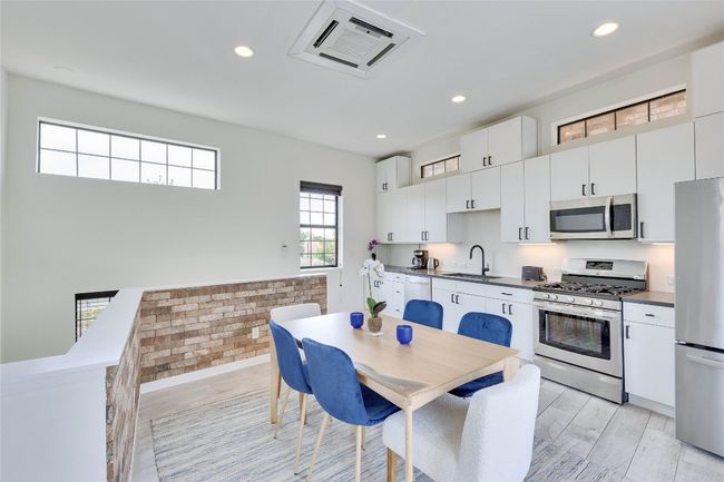 Dining space featuring recessed lighting | Image 21