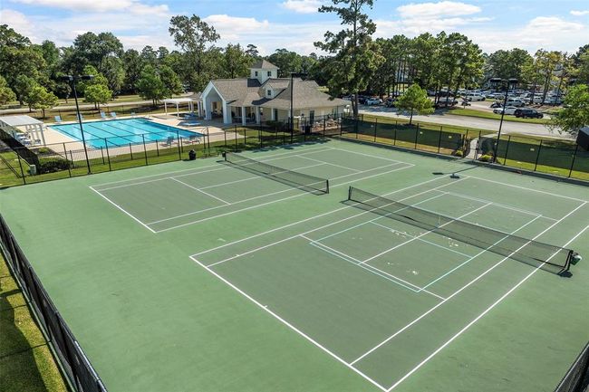 like tennis courts, a pool area | Image 48