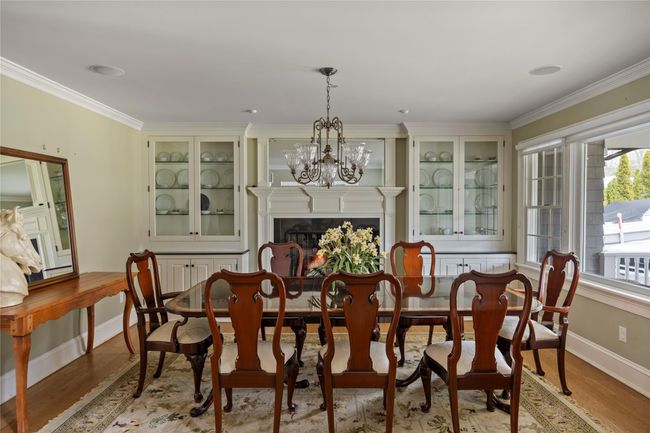 Formal Dining Room with Gas Fireplace | Image 12