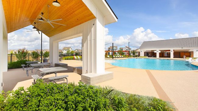Community pool with a patio and a ceiling fan | Image 8