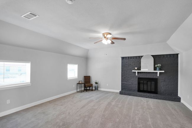 HUGE living room with brand new carpet and woodburning fireplace | Image 9