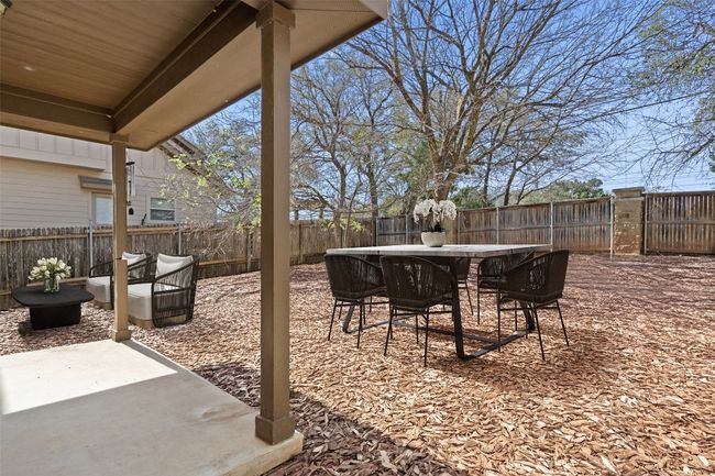 Virtually Staged: The covered patio is ideal for morning coffee or evening relaxation. | Image 18