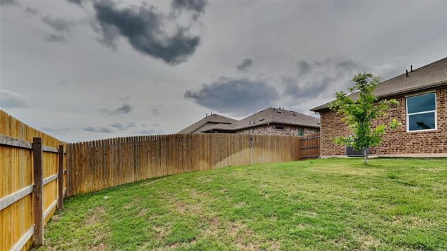 View of yard featuring central AC unit | Image 9