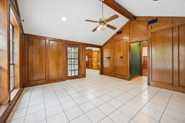 This room overlooks the backyard. | Image 24