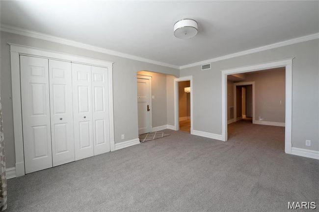 Doorway to property featuring brick siding | Image 24