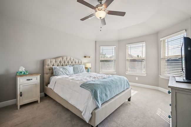 Beautiful and spacious primary bedroom with bayed sitting area. | Image 21