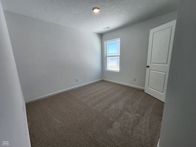 carpeted spare room featuring recessed lighting, visible vents, and baseboards | Image 6
