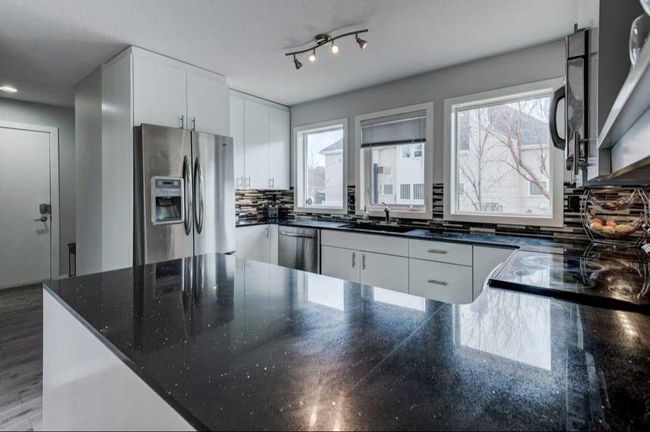 34 Candle Terrace Sw, Home with 2 bedrooms, 1 bathrooms and 4 parking in Calgary AB | Image 8