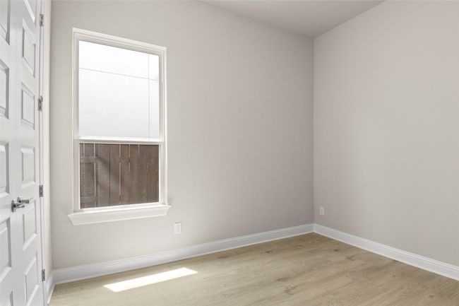 Empty room featuring light wood-type flooring and baseboards | Image 31