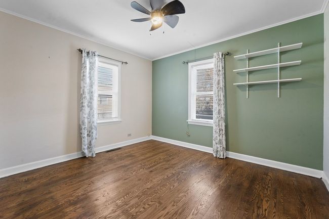 This 1st floor bedroom can be used as a home offic | Image 11