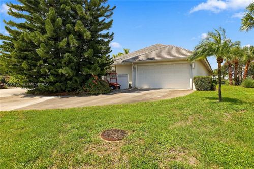 173 Orange Tree Dr, Atlantis, FL, 33462-1129 | Card Image