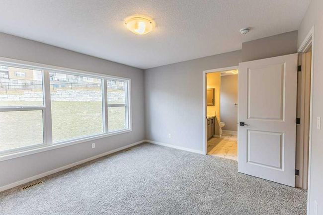 59 Arbour Lake Heights Nw, Home with 3 bedrooms, 2 bathrooms and 4 parking in Calgary AB | Image 20