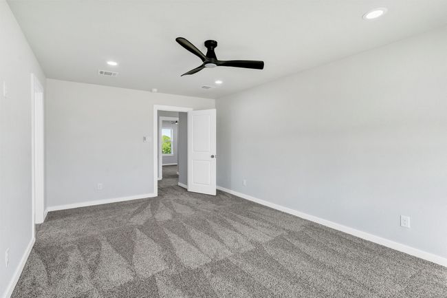 Empty room with carpet, baseboards, recessed lighting, and ceiling fan | Image 25