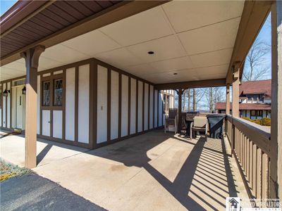 8260 - 8260 Canterbury Drive, Condo with 4 bedrooms, 2 bathrooms and null parking in French Creek NY | Image 3