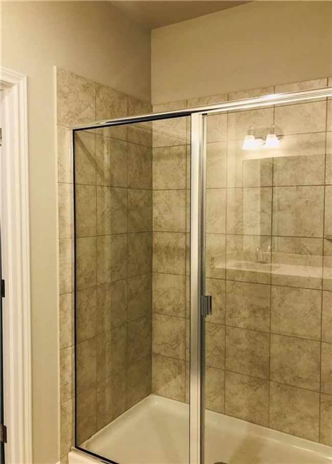 Bathroom with a stall shower | Image 17