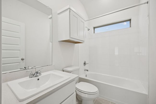 Full bathroom featuring vanity and shower / bath combination | Image 30