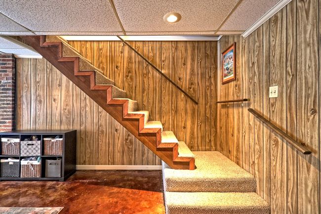 Carpet covered stairway to basement. | Image 23