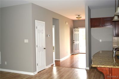 Kitchen with hardwood / wood-style floors | Image 2