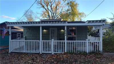 Gorgeous front porch to swing and relax on! | Image 1