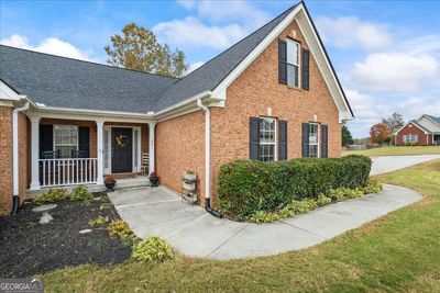 1241 Blue Springs Drive, House other with 3 bedrooms, 2 bathrooms and 4 parking in Loganville GA | Image 3