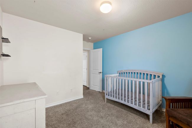 Bedroom featuring carpet floors and baseboards | Image 21