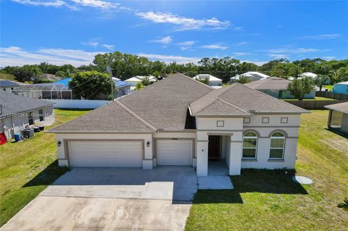 1957 Logan St, Port Saint Lucie, FL, 34953-1351 | Card Image