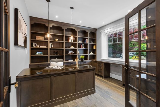 Unfurnished office featuring light wood-type flooring, built in study area, and recessed lighting | Image 17