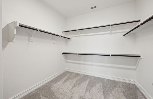 Spacious closet in the owner's suite *Real home pictured | Image 13