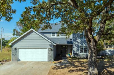 View of front featuring a garage & country views. | Image 2