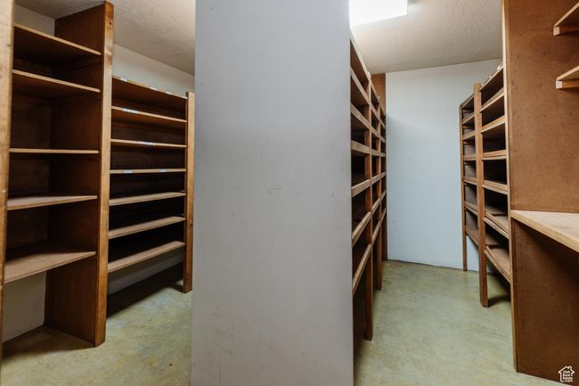 View of walk in closet | Image 15