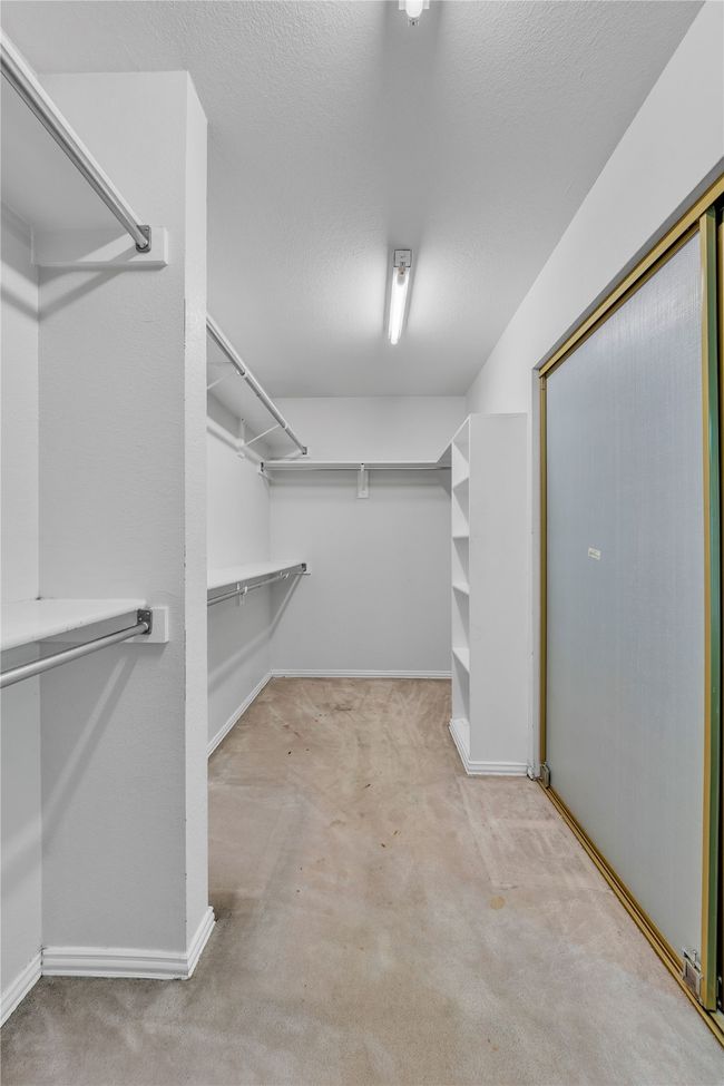View of spacious closet | Image 17