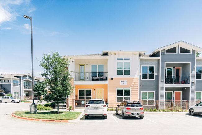 View of property featuring uncovered parking | Image 15