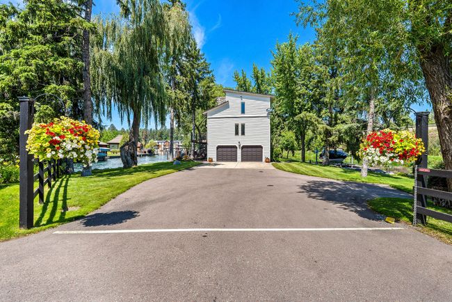 End of the road driveway with ample, valuable parking on your private peninsula | Image 37
